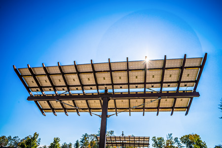 solar panel with sun and blue sky