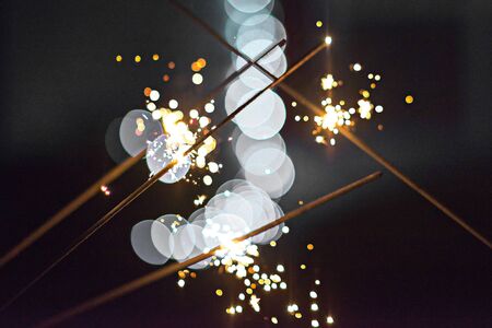 festive abstract sparklers lit up for celebration