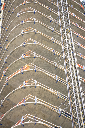 modern city buildings under construction or maintenance