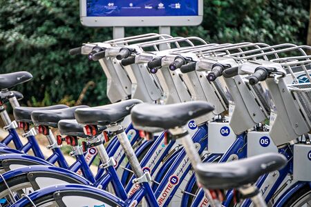 April 22 Charlotte NC - Charlotte city bicycles parked at a rental bike standのeditorial素材