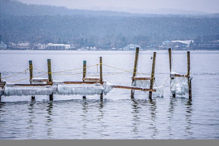 frozen lake michihgan coastline and piersのeditorial素材