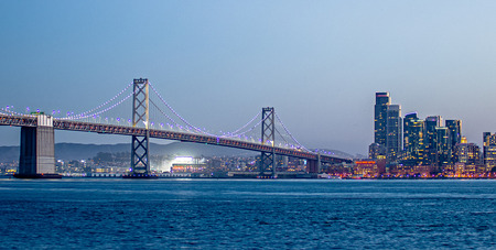 San Francisco skyline and Bay Bridge at sunset Californiaのeditorial素材