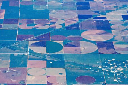 aerial view of farm land crop fields in usaの写真素材