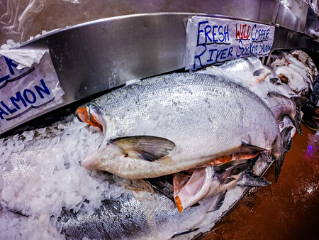 Fresh fish on ice for sale at Pike Place Market in Seattleの写真素材