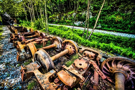old and rusty train wheel on railroad