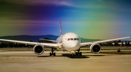 airplane on tarmac at airport about to take off or after landingのeditorial素材