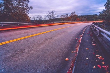 automobile traffic long exposure at dusk in pisgah national park north carolinaの写真素材