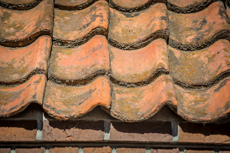 orange color spanish shingle clay roof tileの写真素材