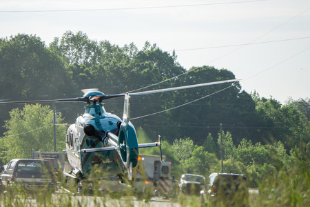 bad accident and rescue by helicopter emergencyの写真素材