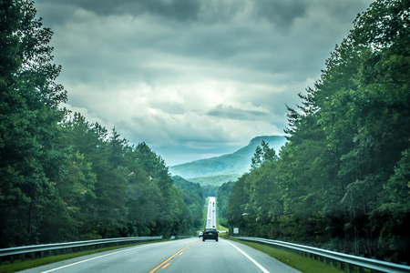 driving through table rock park mountains in south carolinaの写真素材