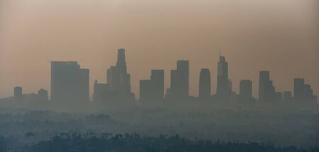 los angeles skyline and suburbs wrapped in smoke from woosle fires in 2018の写真素材