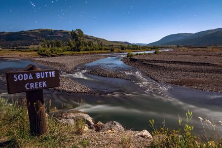 Yellowstone Park Wyoming soda butte creek  at night under full moon