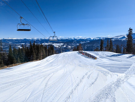 sunny day on slopes in breckenridge colorado ski resortの写真素材