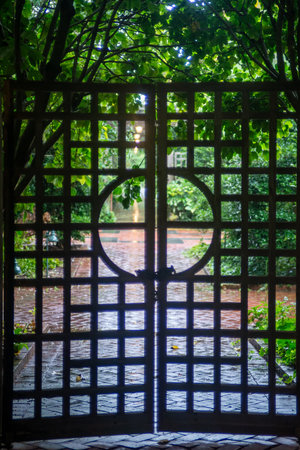 Indoor wedding ceremony with white wedding arch decoratedの写真素材