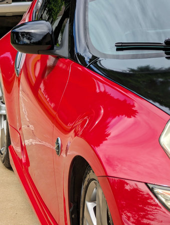 auto detailing close-up outdoor on a sunny dayの写真素材