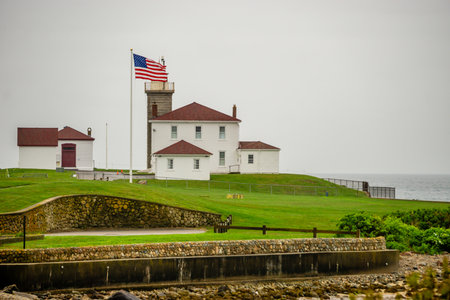 Watch Hill Light in Rhode Island Surrounded by a Stone Seawallの写真素材