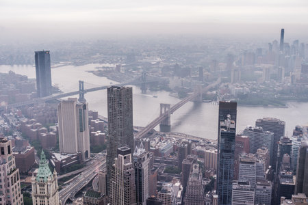 New York City Manhattan midtown aerial panorama view with skyscrapers and cloudy day.の写真素材
