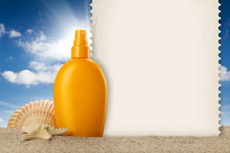 Summer background - suntan oil, shell and blank cardの写真素材
