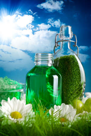 Spa minerals and summer flowersの写真素材