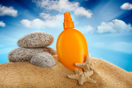 Sunbath - suntan oil の写真素材