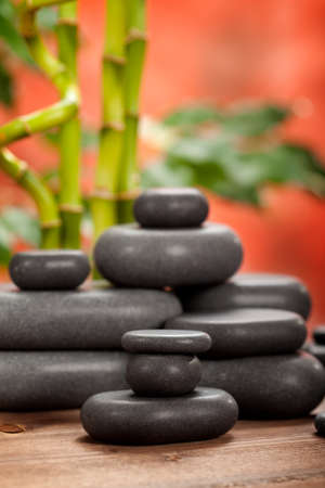 Spa stones on bamboo backgroundの写真素材