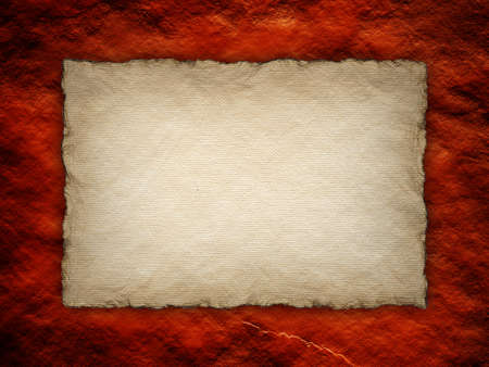 Paper sheet on red rough wall backgroundの写真素材