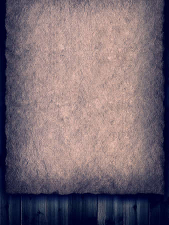 Blank paper sheet on wooden backgroundの写真素材