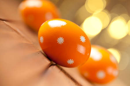 Three Easter eggs on wooden backgroundの写真素材