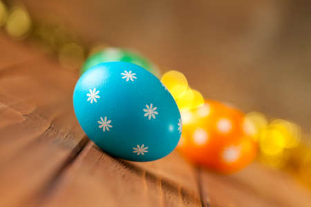 Easter eggs on wooden boards