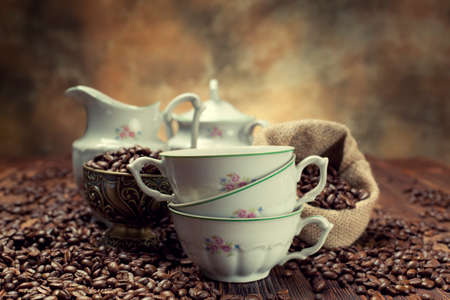 Coffee cup, beans and canvas sackの写真素材