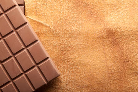 Chocolate bars and blank handmade paper sheetの写真素材