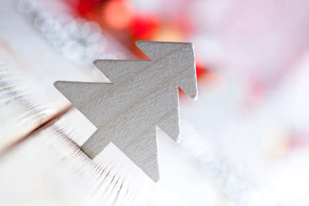 White Christmas tree on wood backgroundの写真素材