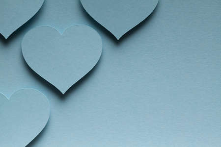 Blue hearts on blue backgroundの写真素材