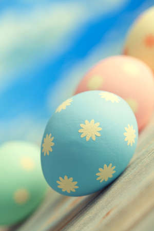 Colored Easter eggs on blue background