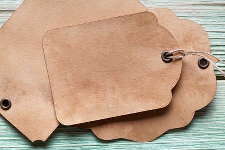 Three labels on wooden board