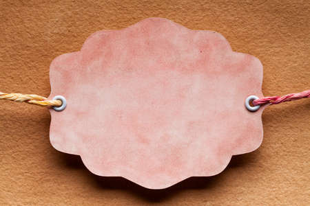 Paper label on paper backgroundの写真素材