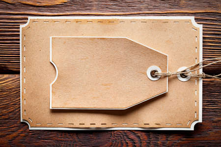 Paper label on wooden backgroundの写真素材