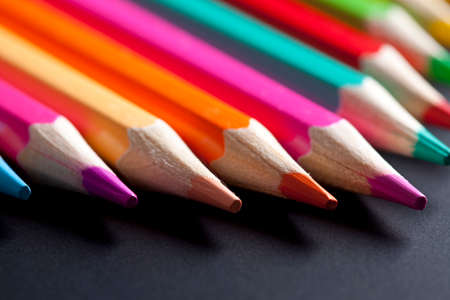 Colorful pencils on black backgroundの写真素材