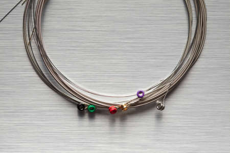 Guitar strings on metal backgroundの写真素材