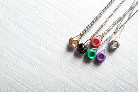 Guitar strings on metal background