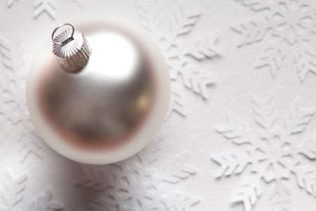 Silver bauble on white backgroundの写真素材