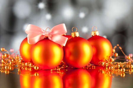 Christmas baubles, ornaments and pink bowの写真素材
