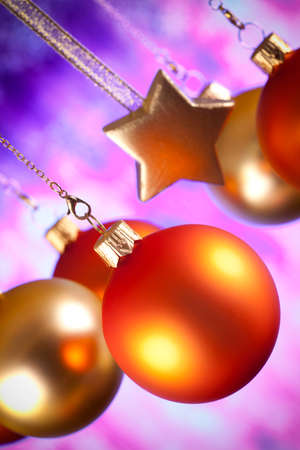 Christmas decorations - baubles and stars on abstract backgroundの写真素材