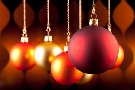 Christmas baubles on pattern backgroundの写真素材