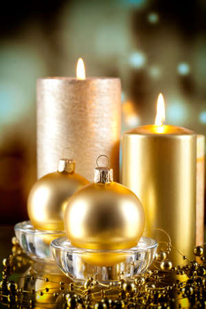Christmas balls and candles on abstract backgroundの写真素材
