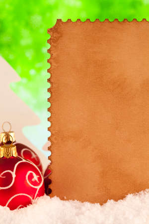 Christmas background - baubles and blank paper cardの写真素材