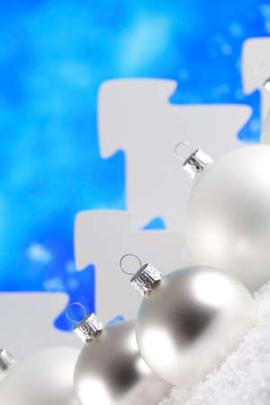 Christmas baubles and trees on snow and abstract backgroundの写真素材