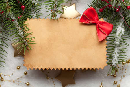 Blank paper card on Christmas backgroundの写真素材