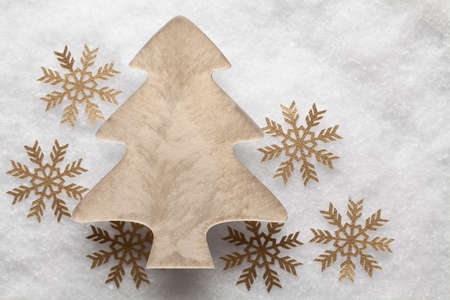 Christmas tree on snow backgroundの写真素材