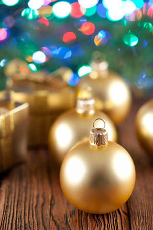 Christmas baubles on wooden backgroundの写真素材